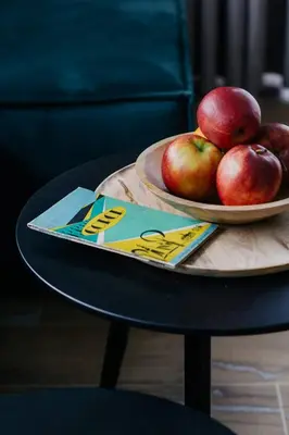 a plate of apples on top of a table at ObidovaGorce in Obidowa