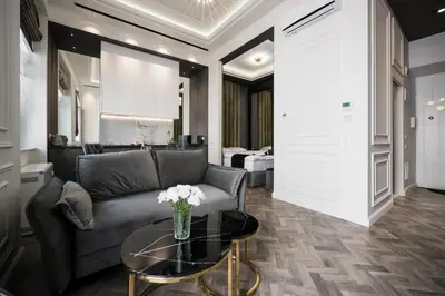 a living room with a couch and a table at Salomea krakow apartments Bożego Ciała in Kraków
