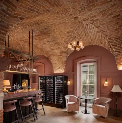a wine tasting room with a brick ceiling at Stradom House, Autograph Collection in Kraków