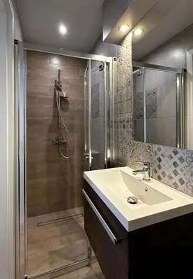 a bathroom with a sink and a shower at Willa Pod Bocianem in Ojców