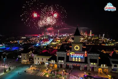 a view of a city with fireworks in the sky at ApartPark Centrum Zator Bronze in Zator