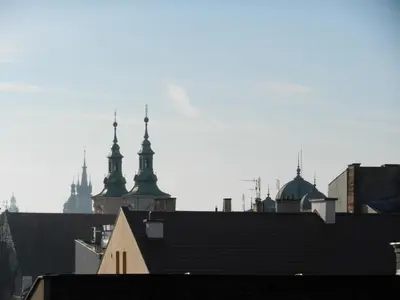 a view of the roofs of buildings in a city at atHome in Kraków