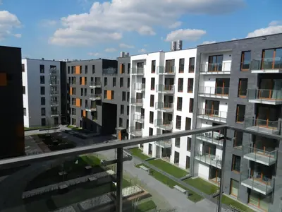 a view from a balcony of apartment buildings at Black Pearl Apartment in Kraków