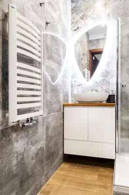 a bathroom with a sink and a mirror at HOUSEHOST Apartment:Bracka 3/15B in Kraków