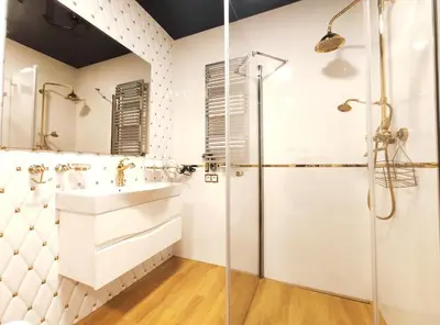 a bathroom with a shower and a sink at Zabłocie 35 by Homeprime in Kraków