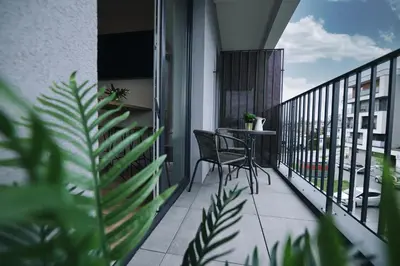 a balcony with a table and chairs on it at ZatoRest 43 by Housine in Zator