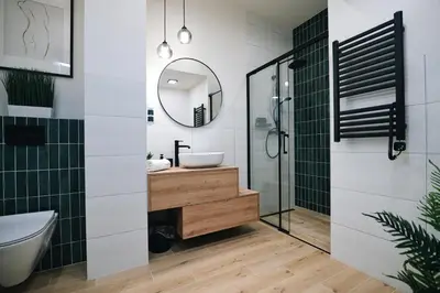 a bathroom with a sink and a mirror at ZatoRest 43 by Housine in Zator