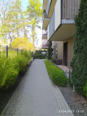 a walkway in front of a building at Mała Góra Apartment in Kraków