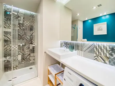 a bathroom with a sink and a shower at Angel MINT Apartment - FREE PARKING - Balcony in Kraków
