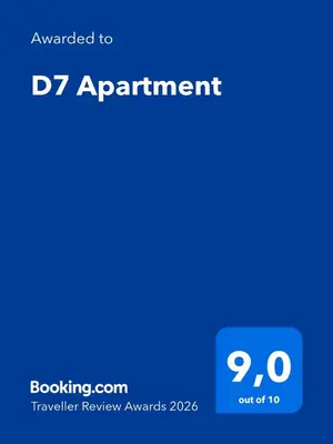 a screenshot of a phone with the text upgraded to appointment at D7 Apartment in Kraków