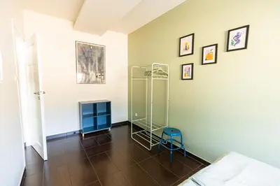 a room with a glass shelf on a wall at Modern House in Old Town Numero 5 in Kraków