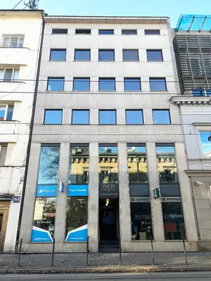 an office building with the doors open on a street at Modern House in Old Town Numero 5 in Kraków