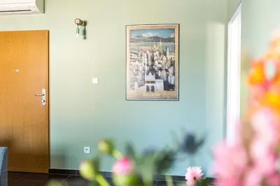 a picture hanging on a wall in a room at Modern House in Old Town Numero 5 in Kraków