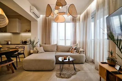 a living room with a couch and a table at Apartament Nairobi by Housine in Zator