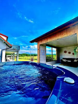 a large swimming pool in front of a house at Lamelove Apartments - Energylandia, Zator in Chocznia