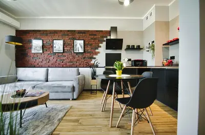 a living room with a couch and a table at Blues Room by Housine in Zator