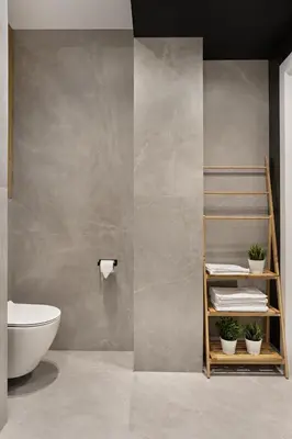 a bathroom with a sink and a toilet in a room at Artis Apartments by Housine in Zator