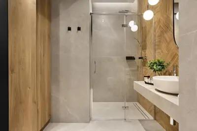 a bathroom with a shower and a sink at Artis Apartments by Housine in Zator