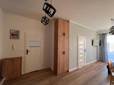 an empty room with a closet and a door at Apartament Marko Due in Zator