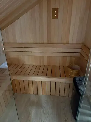 a inside of a sauna with a toilet in it at Secret House Zator in Zator
