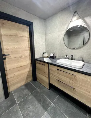 a bathroom with a sink and a mirror at ApartLoft 64 Apartament Zator in Zator