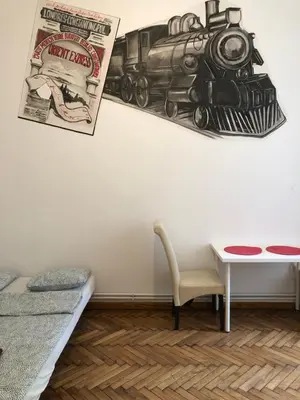 a room with a train picture on the wall at Wawel in Kraków