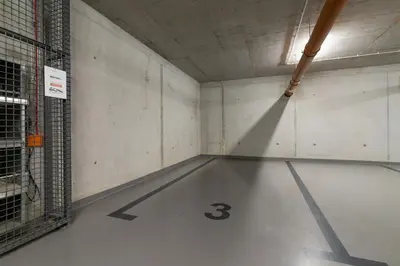 an empty room with a ping pong court at Krowodrza Apartment Premium with Balcony by Renters Prestige in Kraków
