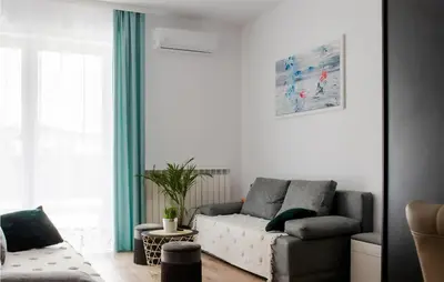 a living room with a couch and a chair at Cozy Apartment In Zator With Wifi in Zator