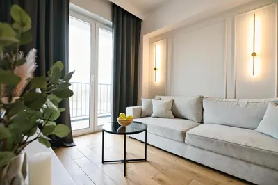 a bedroom with a bed and a desk and a chair at Pastel 47 by Housine in Zator